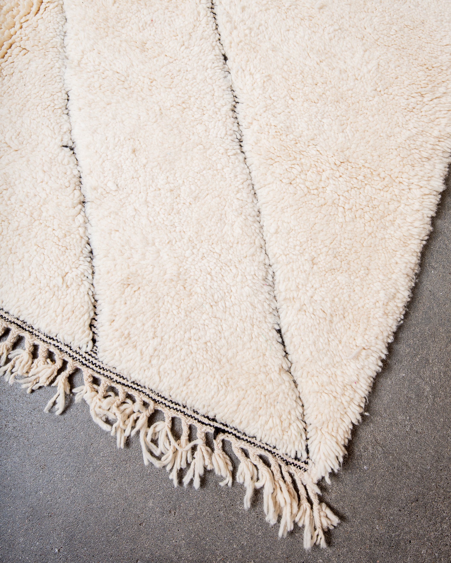 Modern, designer, handcrafted Berber rug from Morocco. Beniourain carpet with beautiful colours and patterns and fluffy wool texture.